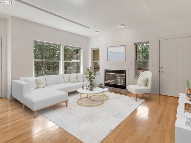 17234 Oakdale Rd, Dallas, OR 97338 - living room with a wealth of natural light, a glass covered fireplace, and light wood finished floors