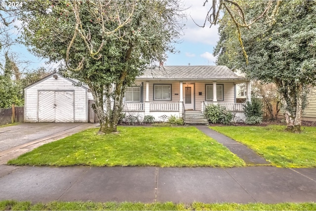 844 SE Cedar St, Hillsboro, OR 97123 - view of front facade with covered porch, an outdoor structure, a garage, and driveway