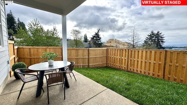 17890 SW Alvord Ln, Beaverton, OR 97007 - fenced backyard with outdoor dining space and a patio area