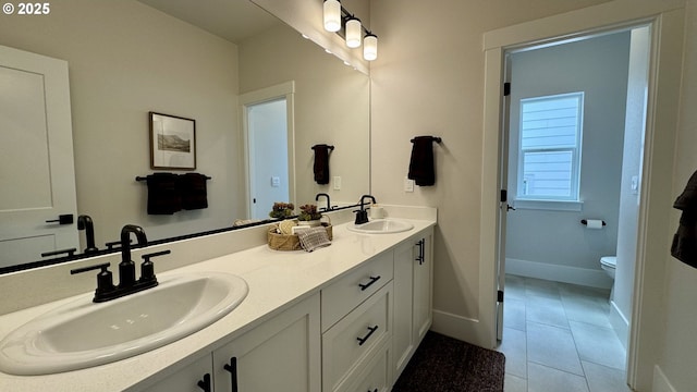 17890 SW Alvord Ln, Beaverton, OR 97007 - bathroom with double vanity and tile patterned flooring