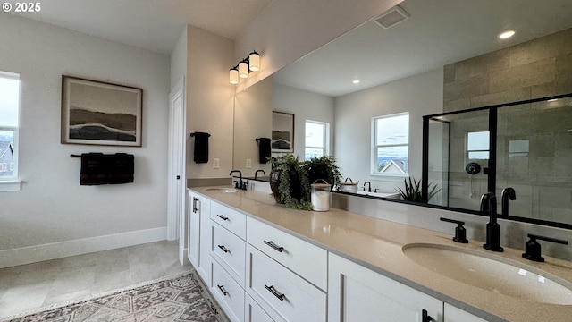 17890 SW Alvord Ln, Beaverton, OR 97007 - bathroom with double vanity, a shower stall, recessed lighting, and tile patterned floors
