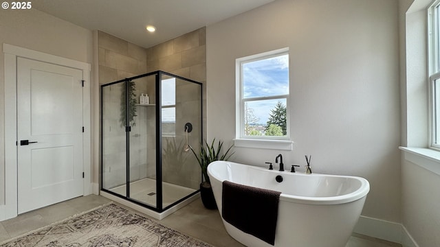 17890 SW Alvord Ln, Beaverton, OR 97007 - full bath with a freestanding bath, a shower stall, tile patterned floors, and recessed lighting
