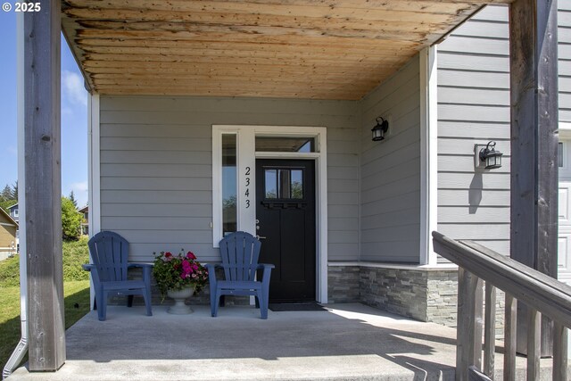 2343 N Fork Rd, Seaside, OR 97138 - property entrance with stone siding