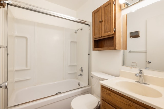 full bathroom featuring vanity, bathtub / shower combination, and toilet