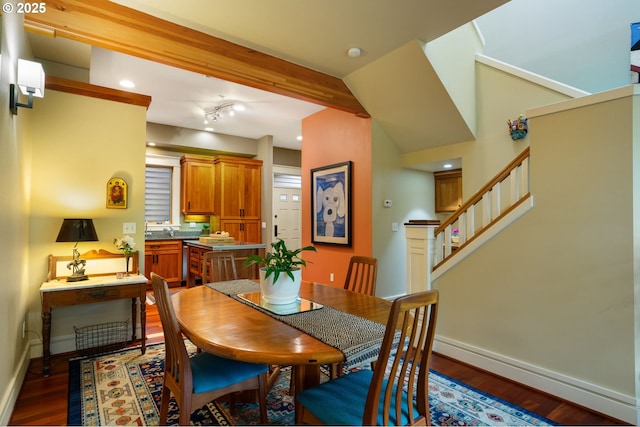 dining area featuring stairs, wood finished floors, baseboards, and recessed lighting