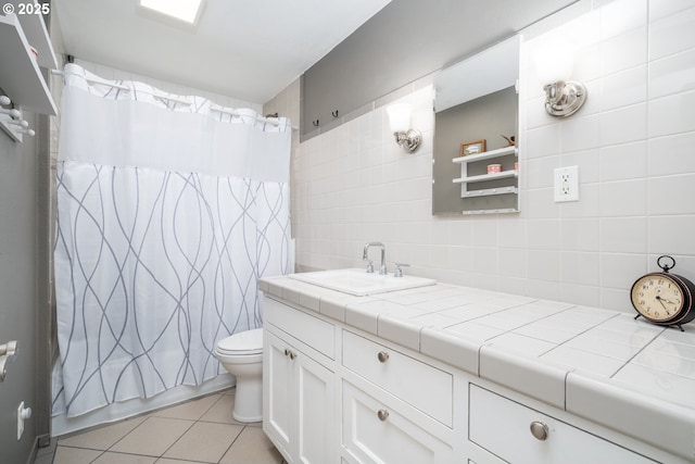 33218 SW Day St, Scappoose, OR 97056 - full bathroom featuring tile patterned flooring, vanity, tasteful backsplash, tile walls, and shower / bathtub combination with curtain