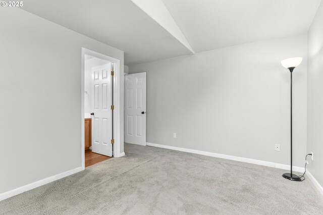 21125 SW Ladyfern Dr, Sherwood, OR 97140 - unfurnished bedroom with carpet, baseboards, and connected bathroom