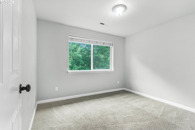 21125 SW Ladyfern Dr, Sherwood, OR 97140 - carpeted spare room featuring baseboards