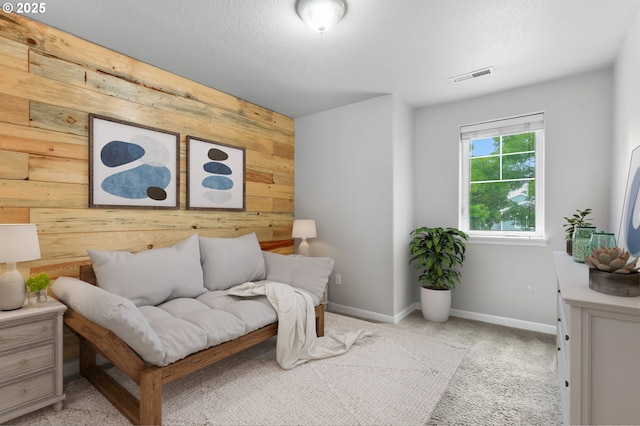21125 SW Ladyfern Dr, Sherwood, OR 97140 - living area with wooden walls, carpet floors, and baseboards