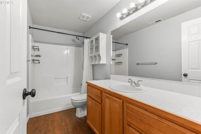 21125 SW Ladyfern Dr, Sherwood, OR 97140 - full bathroom featuring toilet, wood finished floors, shower / bath combo, and vanity