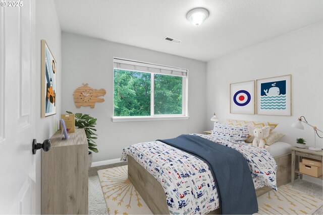21125 SW Ladyfern Dr, Sherwood, OR 97140 - carpeted bedroom featuring baseboards
