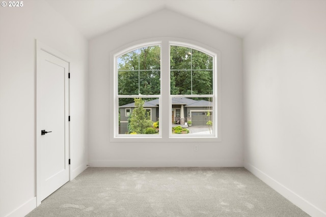 8120 SE 145th Ct, Portland, OR 97236 - carpeted empty room featuring baseboards and vaulted ceiling
