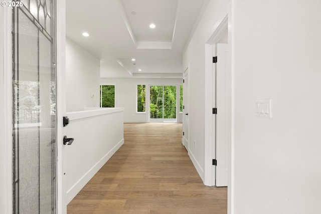 8120 SE 145th Ct, Portland, OR 97236 - corridor with light wood-style flooring, recessed lighting, baseboards, and a raised ceiling