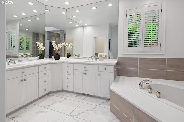 1308 Northshore Rd, Lake Oswego, OR 97034 - full bathroom with double vanity, recessed lighting, a garden tub, marble look tiles, and a tile shower