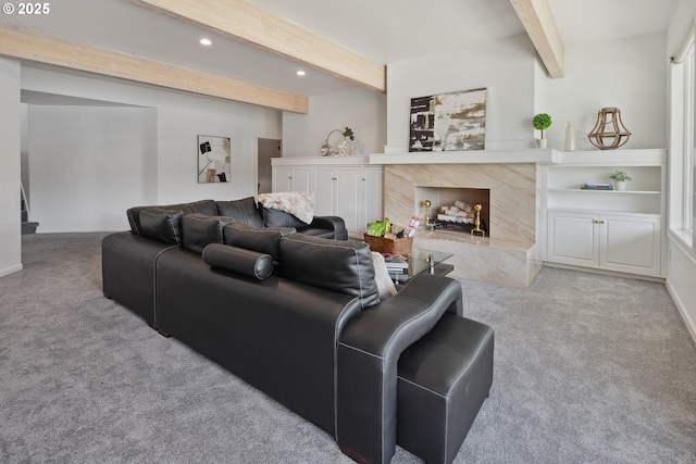 1308 Northshore Rd, Lake Oswego, OR 97034 - living area featuring beamed ceiling, carpet, recessed lighting, stairway, and a premium fireplace