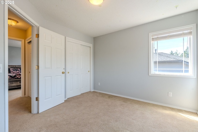 308 SW 38th Loop, Gresham, OR 97080 - unfurnished bedroom featuring carpet and a closet