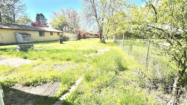 view of yard featuring fence