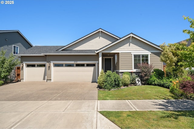 2310 S Heather St, Cornelius, OR 97113 - view of front of house with an attached garage, a front yard, and concrete driveway