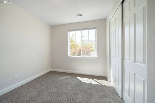 2310 S Heather St, Cornelius, OR 97113 - unfurnished bedroom featuring carpet floors and a closet