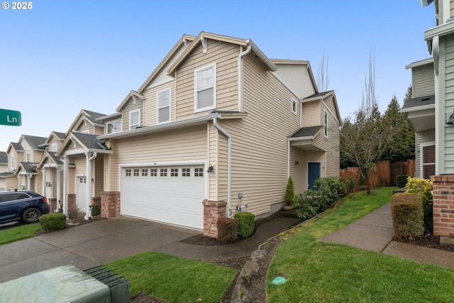 view of front of property with a residential view, driveway, an attached garage, and fence