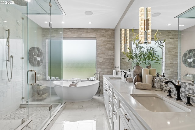 10704 NE 189th St, Battle Ground, WA 98604 - full bath featuring a shower stall, marble finish floors, a freestanding bath, double vanity, and recessed lighting