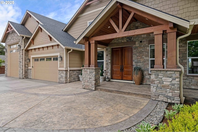 10704 NE 189th St, Battle Ground, WA 98604 - view of front of house featuring stone siding, a garage, driveway, and a shingled roof