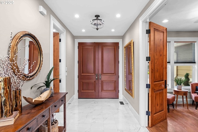 10704 NE 189th St, Battle Ground, WA 98604 - entryway featuring baseboards, recessed lighting, and light marble finish flooring