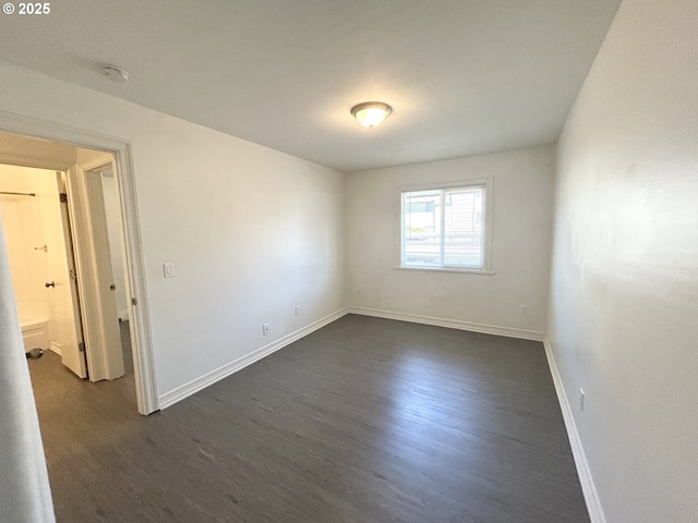 200 SW Florence Ave Unit I 14, Gresham, OR 97080 - empty room featuring dark wood finished floors and a smoke detector