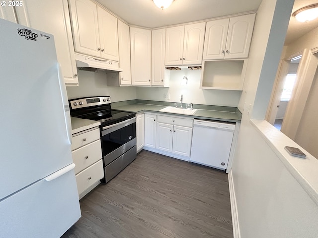 200 SW Florence Ave Unit I 14, Gresham, OR 97080 - kitchen with white appliances, under cabinet range hood, dark wood-style flooring, and white cabinetry