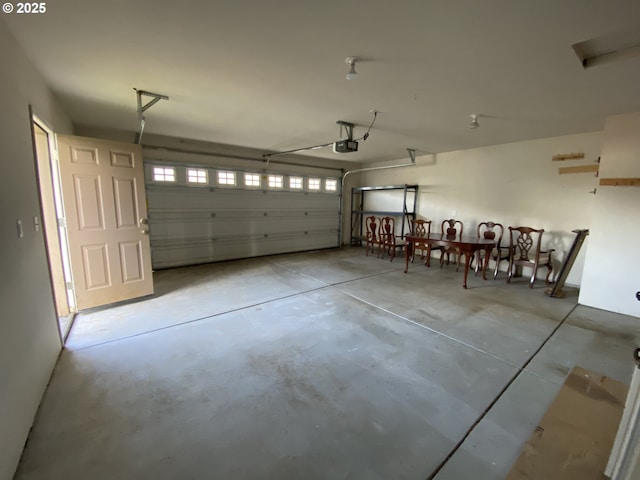 garage featuring a garage door opener