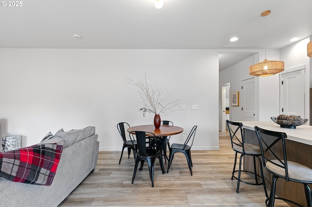 88104 7th St, Veneta, OR 97487 - dining room with light wood-type flooring, recessed lighting, and baseboards