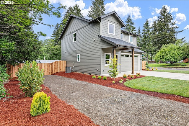 88104 7th St, Veneta, OR 97487 - view of front of house featuring concrete driveway, crawl space, central AC, and an attached garage