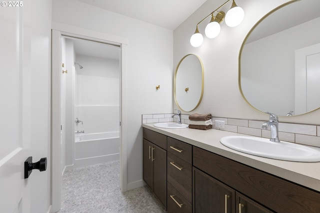 88104 7th St, Veneta, OR 97487 - bathroom with double vanity,  shower combination, decorative backsplash, and baseboards
