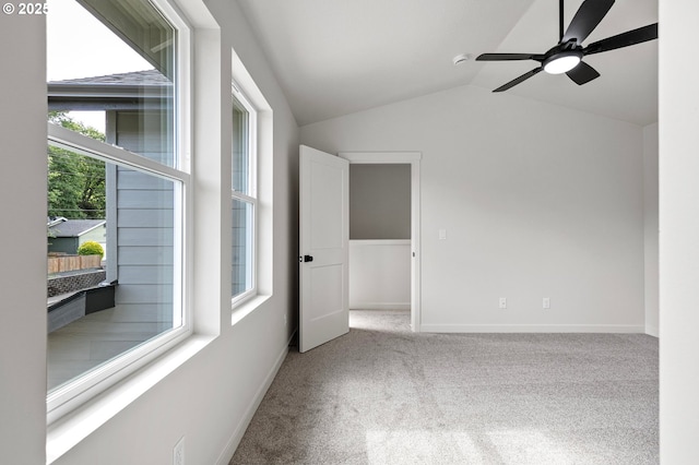 88104 7th St, Veneta, OR 97487 - empty room with vaulted ceiling, carpet flooring, a ceiling fan, and baseboards