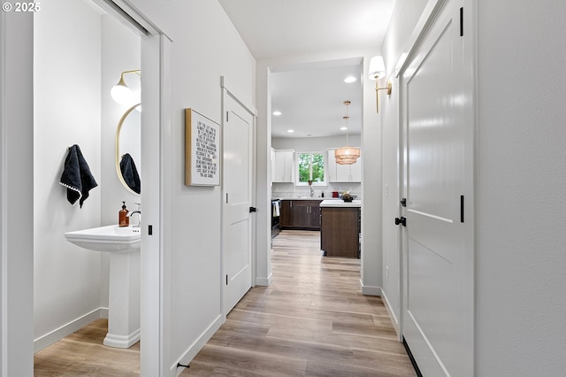 88104 7th St, Veneta, OR 97487 - hallway featuring recessed lighting, light wood-style flooring, and baseboards
