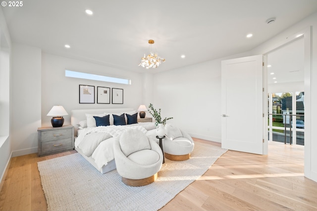 bedroom with multiple windows, baseboards, and recessed lighting