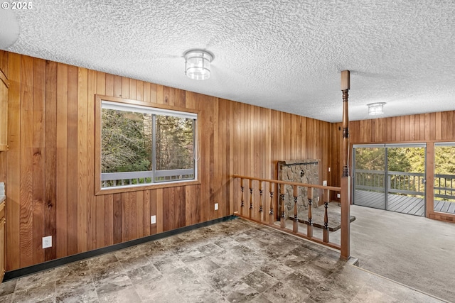 39402 NE 211th Ave, Amboy, WA 98601 - unfurnished room with plenty of natural light and wood walls