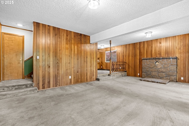 39402 NE 211th Ave, Amboy, WA 98601 - finished basement with a textured ceiling, wood walls, stairway, and carpet