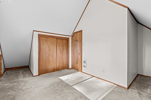 39402 NE 211th Ave, Amboy, WA 98601 - unfurnished bedroom featuring carpet flooring, vaulted ceiling, a closet, and baseboards