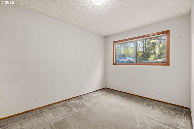 39402 NE 211th Ave, Amboy, WA 98601 - carpeted spare room with baseboards and a textured ceiling