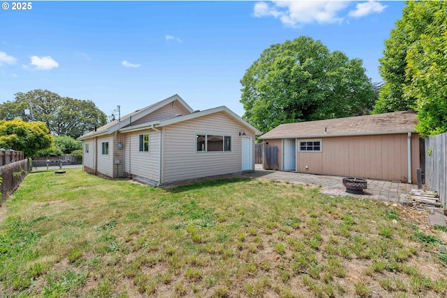 93753 E Mill Ln, Coos Bay, OR 97420 - rear view of property with an outdoor fire pit and a patio