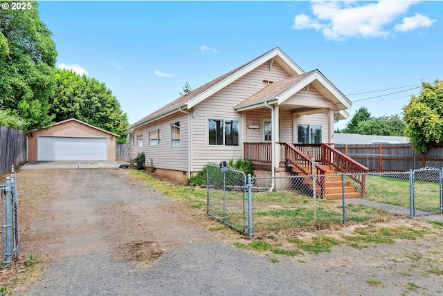93753 E Mill Ln, Coos Bay, OR 97420 - view of front of property with a gate, a garage, and an outdoor structure