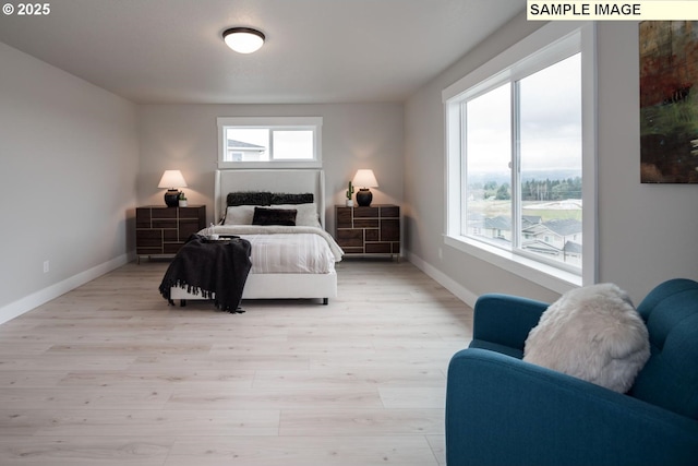 8002 N Haregrave St, Camas, WA 98607 - bedroom featuring light wood finished floors and baseboards