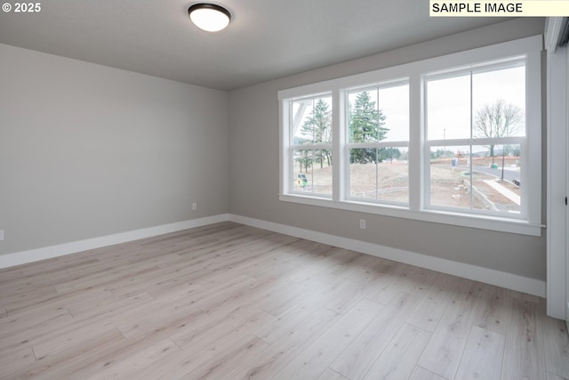 8002 N Haregrave St, Camas, WA 98607 - spare room featuring light wood finished floors and baseboards