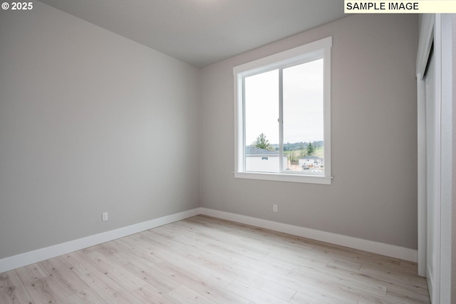8002 N Haregrave St, Camas, WA 98607 - unfurnished room featuring light wood-type flooring and baseboards