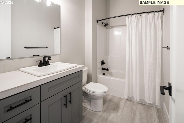 8002 N Haregrave St, Camas, WA 98607 - bathroom featuring shower / bath combination with curtain, vanity, toilet, and wood finished floors