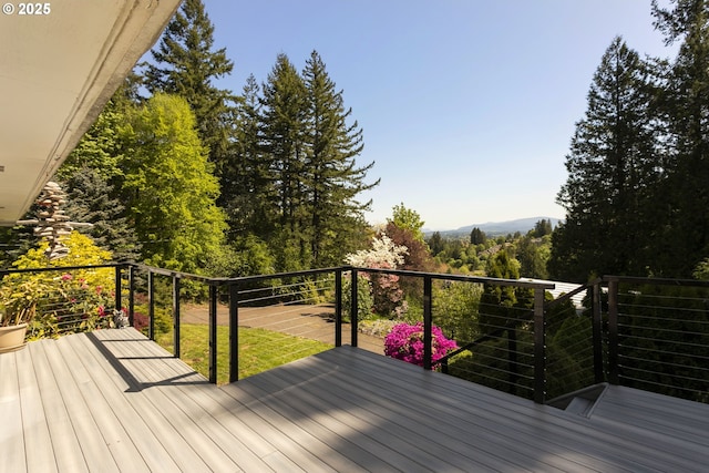 wooden terrace featuring a mountain view
