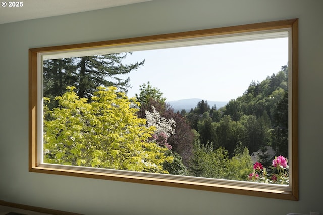details featuring a wooded view