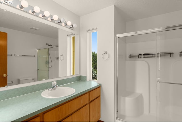 16149 SW Snapdragon Ln, Tigard, OR 97223 - bathroom with a shower stall and vanity