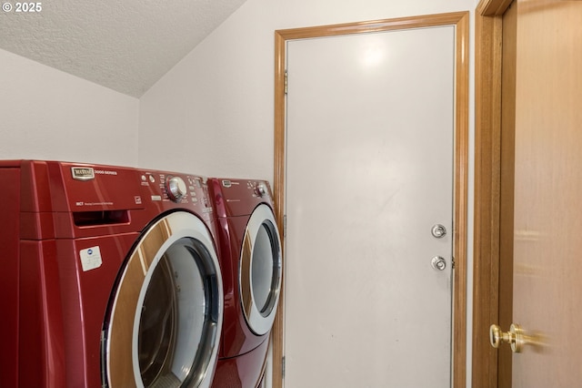16149 SW Snapdragon Ln, Tigard, OR 97223 - washroom with washer and clothes dryer and a textured ceiling